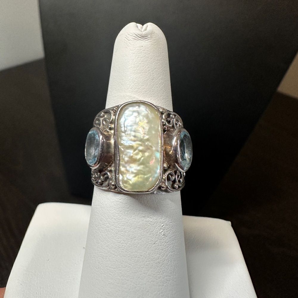 Genuine pearl and blue topaz in sterling silver ring!